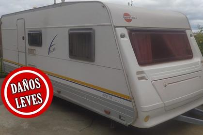 Compra y venta de coches rotos.